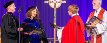 From left, Regent Ann Boynton '83, President Lori E. Varlotta, PhD, Bishop Deborah Hutterer, MDiv, and the Rev. Jim Bessey '66, MDiv, participate in the Feb. 27 installation ceremony.