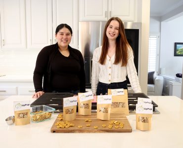 Princesa Martinez and Rosie Baker in a kitchen with products
