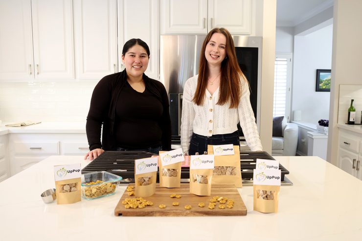 Princesa Martinez and Rosie Baker in a kitchen with products